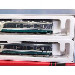 ACME 55116 - deux voitures-couchettes de 2e classe, une de 2e classe et une mixte 1re/2e classe aux couleurs FS XMPR, époque VI.